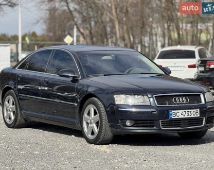 Синий Ауди А8, объемом двигателя 4 л и пробегом 453 тыс. км за 7300 $, фото 1 на Automoto.ua