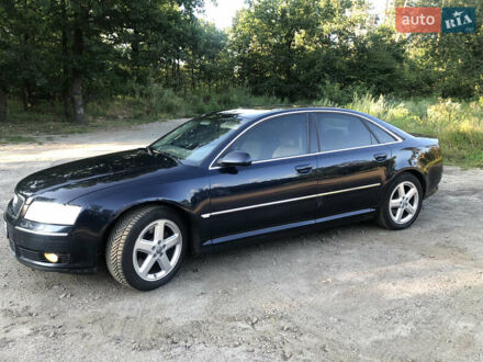 Синий Ауди А8, объемом двигателя 4 л и пробегом 450 тыс. км за 7500 $, фото 1 на Automoto.ua