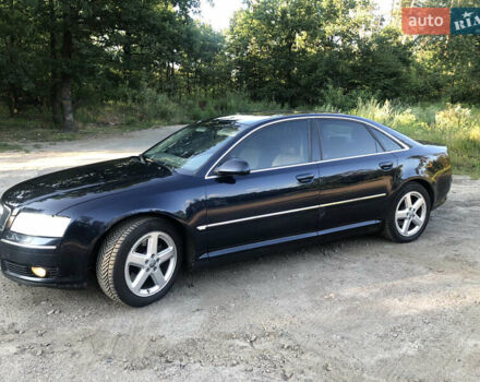 Синий Ауди А8, объемом двигателя 4 л и пробегом 450 тыс. км за 7500 $, фото 1 на Automoto.ua