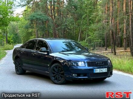 Синий Ауди А8, объемом двигателя 3 л и пробегом 305 тыс. км за 6399 $, фото 1 на Automoto.ua