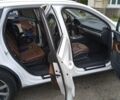 Белый Ауди Ку 7, объемом двигателя 1.98 л и пробегом 77 тыс. км за 28000 $, фото 2 на Automoto.ua