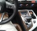 Белый Ауди Ку 7, объемом двигателя 1.98 л и пробегом 77 тыс. км за 28000 $, фото 4 на Automoto.ua