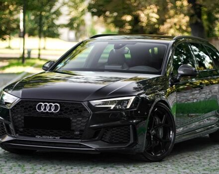 Черный Ауди РС4, объемом двигателя 3 л и пробегом 42 тыс. км за 14000 $, фото 2 на Automoto.ua