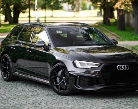 Черный Ауди РС4, объемом двигателя 3 л и пробегом 42 тыс. км за 14000 $, фото 1 на Automoto.ua