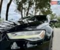Черный Ауди С6, объемом двигателя 4 л и пробегом 135 тыс. км за 22499 $, фото 11 на Automoto.ua