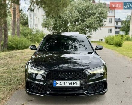 Черный Ауди С6, объемом двигателя 4 л и пробегом 135 тыс. км за 22499 $, фото 1 на Automoto.ua