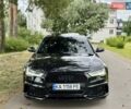 Черный Ауди С6, объемом двигателя 4 л и пробегом 135 тыс. км за 22499 $, фото 1 на Automoto.ua