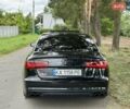 Черный Ауди С6, объемом двигателя 4 л и пробегом 135 тыс. км за 22499 $, фото 5 на Automoto.ua