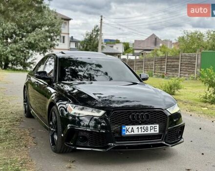 Черный Ауди С6, объемом двигателя 4 л и пробегом 135 тыс. км за 22499 $, фото 2 на Automoto.ua