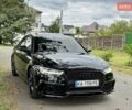 Черный Ауди С6, объемом двигателя 4 л и пробегом 135 тыс. км за 22499 $, фото 2 на Automoto.ua