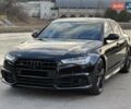 Черный Ауди С6, объемом двигателя 4 л и пробегом 73 тыс. км за 30500 $, фото 1 на Automoto.ua