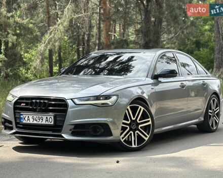Серый Ауди С6, объемом двигателя 4 л и пробегом 163 тыс. км за 17900 $, фото 1 на Automoto.ua