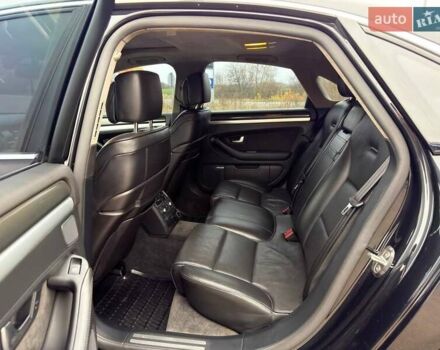 Черный Ауди С8, объемом двигателя 5.2 л и пробегом 153 тыс. км за 22777 $, фото 24 на Automoto.ua