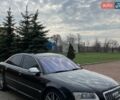 Черный Ауди С8, объемом двигателя 5.2 л и пробегом 360 тыс. км за 12800 $, фото 1 на Automoto.ua