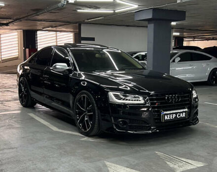 Черный Ауди С8, объемом двигателя 4 л и пробегом 205 тыс. км за 34000 $, фото 2 на Automoto.ua