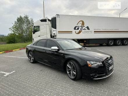 Черный Ауди С8, объемом двигателя 4 л и пробегом 119 тыс. км за 30990 $, фото 1 на Automoto.ua