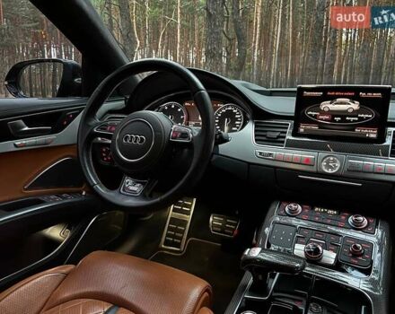 Синий Ауди С8, объемом двигателя 4 л и пробегом 58 тыс. км за 94436 $, фото 1 на Automoto.ua