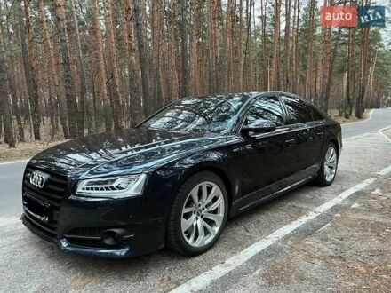 Синий Ауди С8, объемом двигателя 4 л и пробегом 58 тыс. км за 94436 $, фото 1 на Automoto.ua