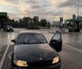 Черный БМВ 1 Серия, объемом двигателя 2 л и пробегом 293 тыс. км за 6300 $, фото 1 на Automoto.ua