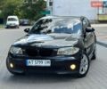 Черный БМВ 1 Серия, объемом двигателя 1.6 л и пробегом 298 тыс. км за 4000 $, фото 1 на Automoto.ua
