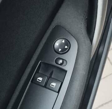 Черный БМВ 1 Серия, объемом двигателя 2 л и пробегом 205 тыс. км за 5600 $, фото 19 на Automoto.ua