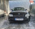 Черный БМВ 1 Серия, объемом двигателя 1.6 л и пробегом 205 тыс. км за 5000 $, фото 1 на Automoto.ua
