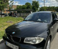 Черный БМВ 1 Серия, объемом двигателя 2 л и пробегом 245 тыс. км за 6500 $, фото 1 на Automoto.ua