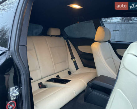 Черный БМВ 1 Серия, объемом двигателя 2 л и пробегом 304 тыс. км за 6990 $, фото 12 на Automoto.ua