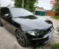 Черный БМВ 1 Серия, объемом двигателя 1.6 л и пробегом 260 тыс. км за 6000 $, фото 1 на Automoto.ua