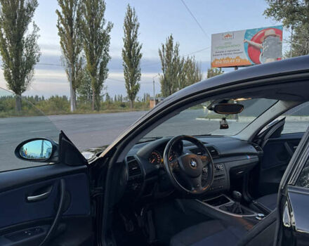 Черный БМВ 1 Серия, объемом двигателя 2 л и пробегом 237 тыс. км за 7700 $, фото 10 на Automoto.ua