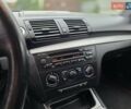 Черный БМВ 1 Серия, объемом двигателя 2 л и пробегом 210 тыс. км за 5700 $, фото 27 на Automoto.ua