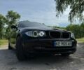 Черный БМВ 1 Серия, объемом двигателя 1.6 л и пробегом 150 тыс. км за 7500 $, фото 1 на Automoto.ua