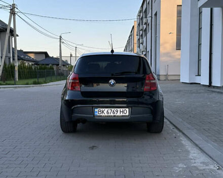 Черный БМВ 1 Серия, объемом двигателя 2 л и пробегом 308 тыс. км за 7200 $, фото 1 на Automoto.ua