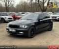 Черный БМВ 1 Серия, объемом двигателя 1.6 л и пробегом 217 тыс. км за 7500 $, фото 1 на Automoto.ua