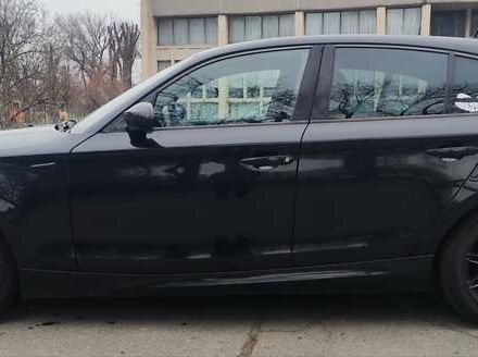 Черный БМВ 1 Серия, объемом двигателя 2 л и пробегом 275 тыс. км за 7800 $, фото 3 на Automoto.ua