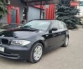 Черный БМВ 1 Серия, объемом двигателя 2 л и пробегом 230 тыс. км за 7200 $, фото 1 на Automoto.ua