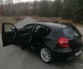 Черный БМВ 1 Серия, объемом двигателя 2 л и пробегом 193 тыс. км за 9450 $, фото 1 на Automoto.ua