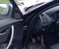 Черный БМВ 1 Серия, объемом двигателя 2 л и пробегом 270 тыс. км за 6200 $, фото 1 на Automoto.ua