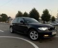 Черный БМВ 1 Серия, объемом двигателя 2 л и пробегом 159 тыс. км за 6700 $, фото 1 на Automoto.ua