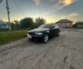 Черный БМВ 1 Серия, объемом двигателя 2 л и пробегом 149 тыс. км за 7550 $, фото 1 на Automoto.ua