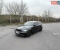 Черный БМВ 1 Серия, объемом двигателя 2 л и пробегом 213 тыс. км за 7350 $, фото 1 на Automoto.ua