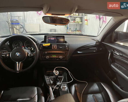 Черный БМВ 1 Серия, объемом двигателя 1.6 л и пробегом 296 тыс. км за 8300 $, фото 1 на Automoto.ua