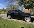 Черный БМВ 1 Серия, объемом двигателя 1.6 л и пробегом 348 тыс. км за 8700 $, фото 4 на Automoto.ua