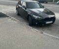 Чорний БМВ 1 Серія, об'ємом двигуна 2 л та пробігом 203 тис. км за 10500 $, фото 1 на Automoto.ua