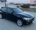 Черный БМВ 1 Серия, объемом двигателя 1.6 л и пробегом 280 тыс. км за 9000 $, фото 1 на Automoto.ua