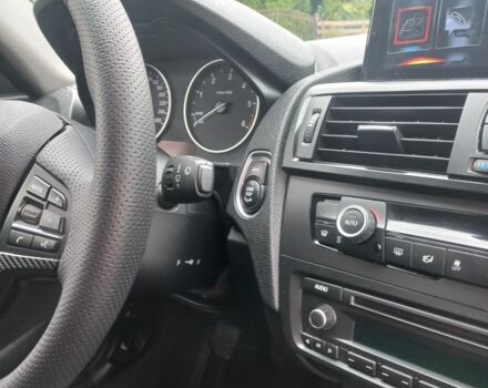 Черный БМВ 1 Серия, объемом двигателя 2 л и пробегом 230 тыс. км за 9700 $, фото 16 на Automoto.ua