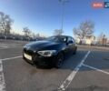 Черный БМВ 1 Серия, объемом двигателя 2 л и пробегом 181 тыс. км за 14800 $, фото 1 на Automoto.ua