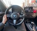 Чорний БМВ 1 Серія, об'ємом двигуна 2 л та пробігом 181 тис. км за 13999 $, фото 1 на Automoto.ua