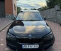 Черный БМВ 1 Серия, объемом двигателя 1.5 л и пробегом 185 тыс. км за 12798 $, фото 1 на Automoto.ua