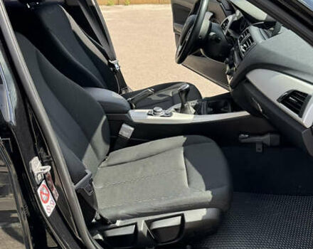 Черный БМВ 1 Серия, объемом двигателя 1.5 л и пробегом 155 тыс. км за 13600 $, фото 10 на Automoto.ua